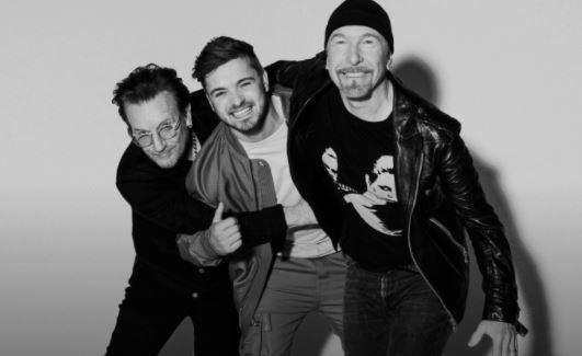 Знаменитата ирландска рок група U2 обединява творчески сили с популярния
